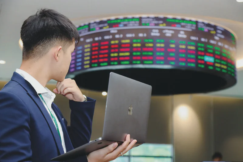 Investor analyzing FTSE upgrade opportunities